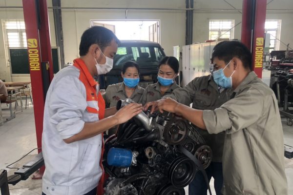 Students in practical session at Automotive repair class