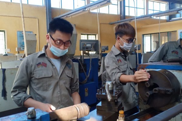 Students in practical session at Metal cutting class